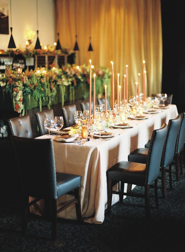 dining table with candles and place settings